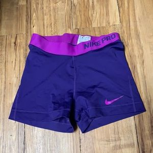 Purple Nike spandex shorts